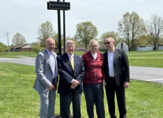 
			
				                                On the sunny afternoon of April 22, school administrators, teachers, and students gathered for the official dedication of Ralph Sininger Way on the Georgetown Exempted Village Schools campus. From the left, Eric Toole (Treasurer), Dr. Raymond Virost (GEVS Board president), Ralph Sininger, and Brad Winterod (GEVS superintendent). Photo Provided
 
			
		