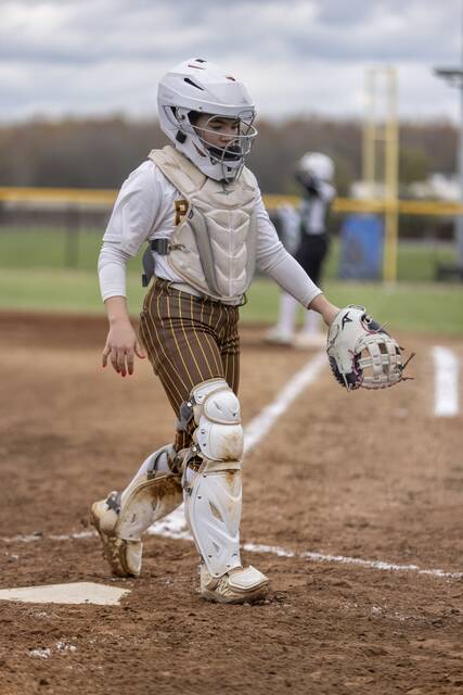 131496095_web1_UTF-8IMG_3352
Western Brown catcher Josie Sissel takes her position behind the plate during a game this season. Photo courtesy of Titus Green