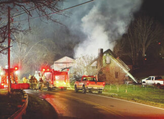 
			
				                                Multiple fire crews responded to a house fire on Ripley Road just outside of Ripley on the evening of Nov. 11. Photo by Wade Linville
 
			
		