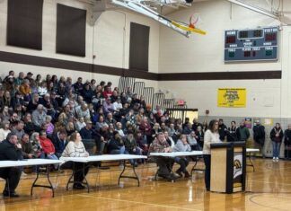 
			
				                                Christina Colegate addresses council regarding the plans for the mega-site in Mt. Orab during the Jan. 27 Village of Mt. Orab special council meeting held at Mt. Orab Middle School. Photo by Wade Linville
 
			
		