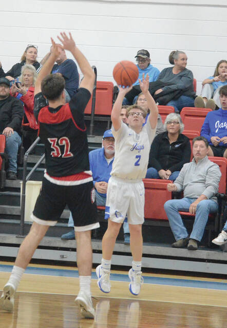 Ripleys Landon Dickhaus launches a shot from three-point range during the Blue Jays Feb. 19 game against Eastern. Photo by Wade Linville